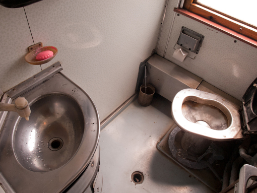 Dry closet in an electric train