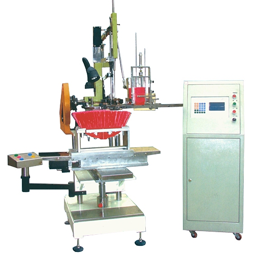 Brush making machine