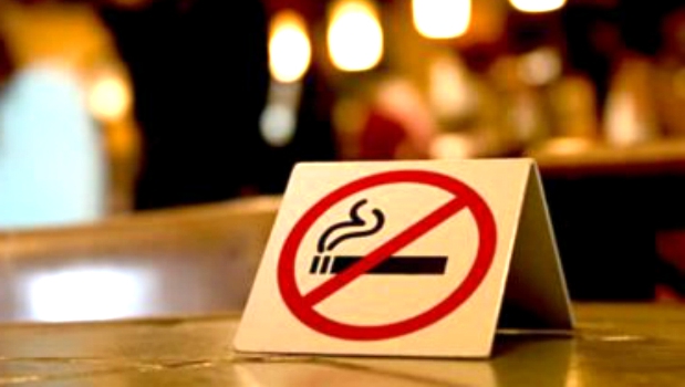 smoking in the entrance of a residential building