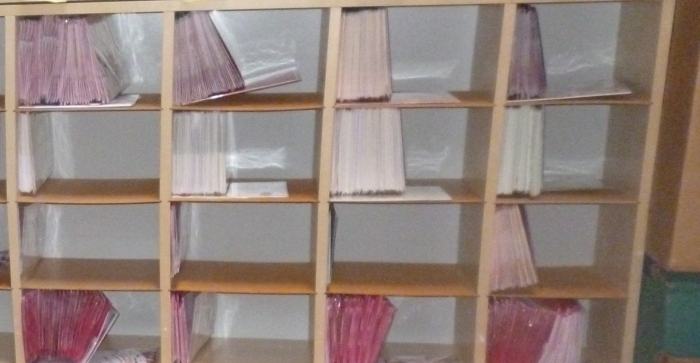 placing business cards on stands