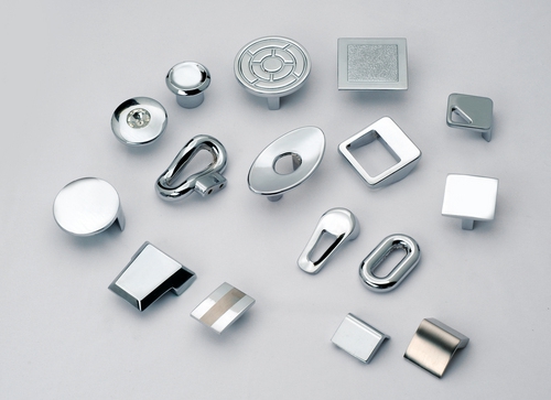 Machines for the production of furniture fittings