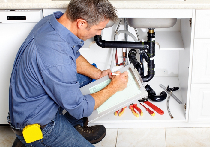 Replacing a water meter.