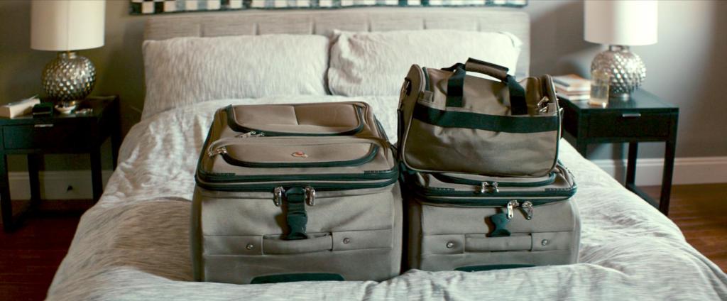 Suitcases on the bed