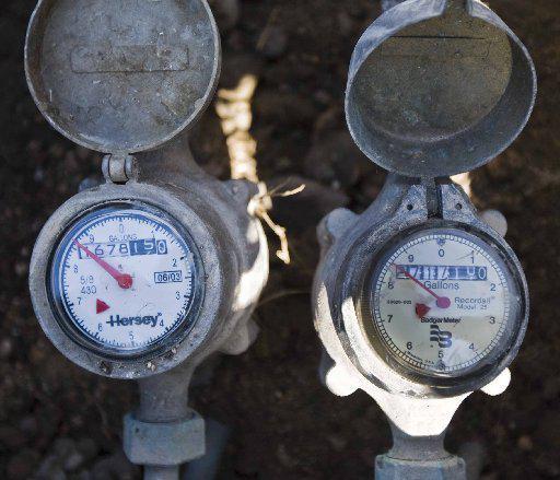 calibration of water meters without removal