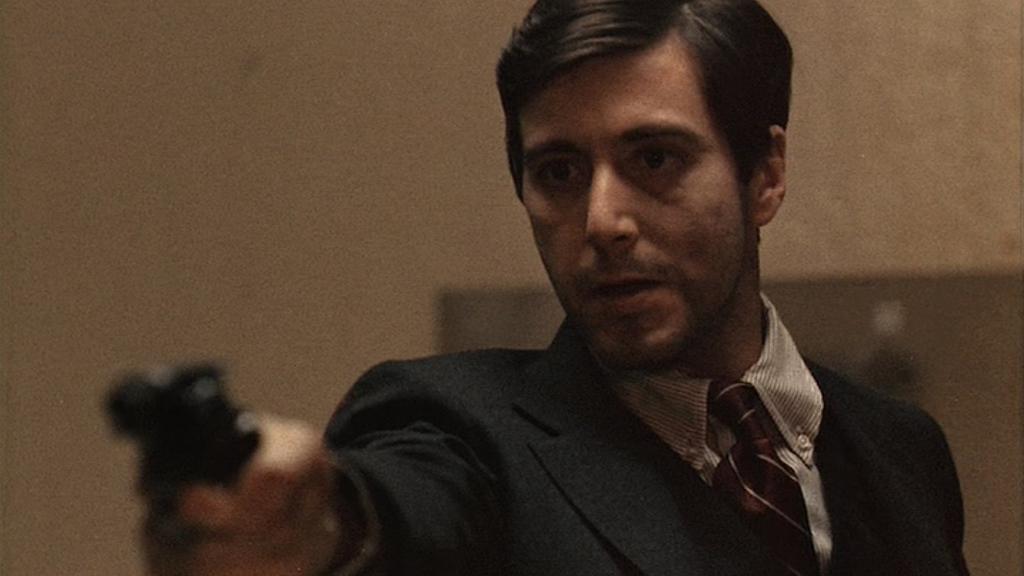 Michael shoots Turk and captain Mark McCluskey in a restaurant