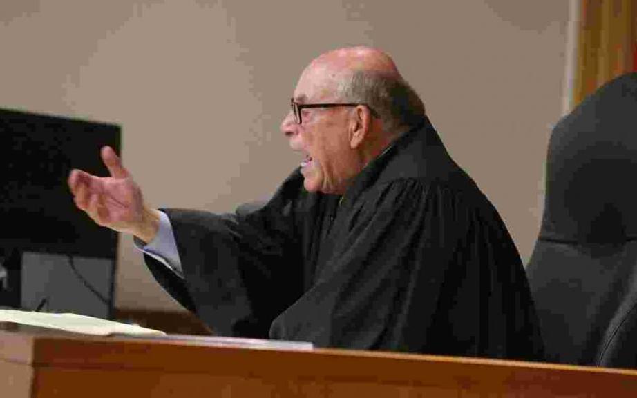 on canceling the review of the decision in absentia