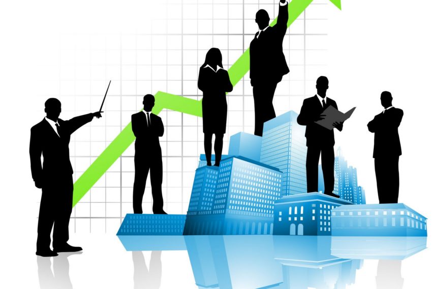 silhouettes of managers planning sales growth