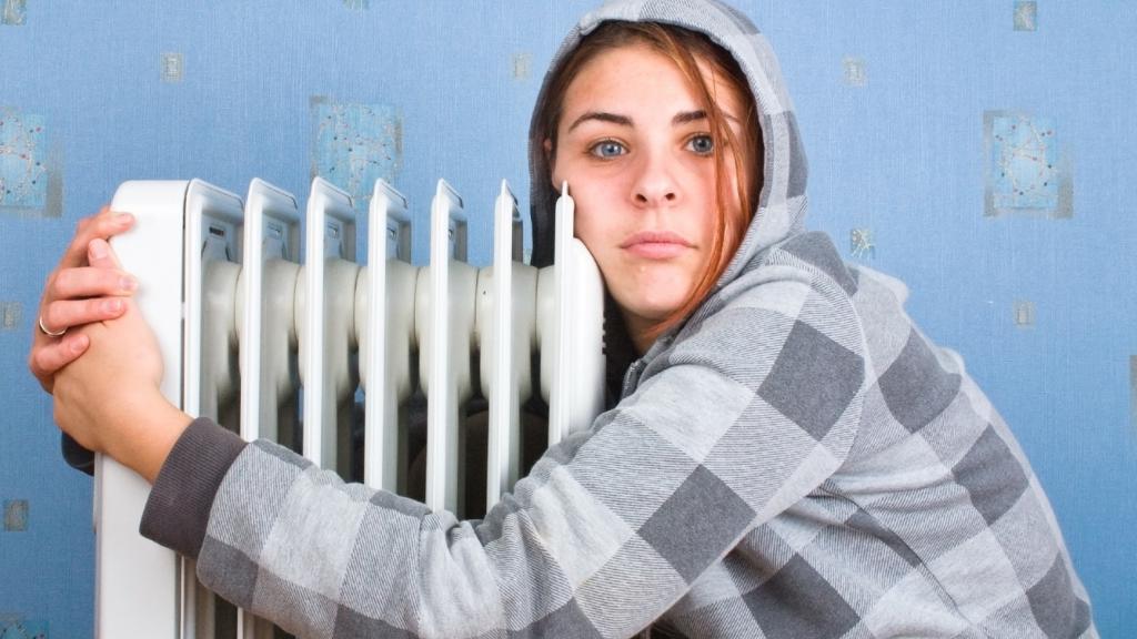 The girl is basking in the oil cooler