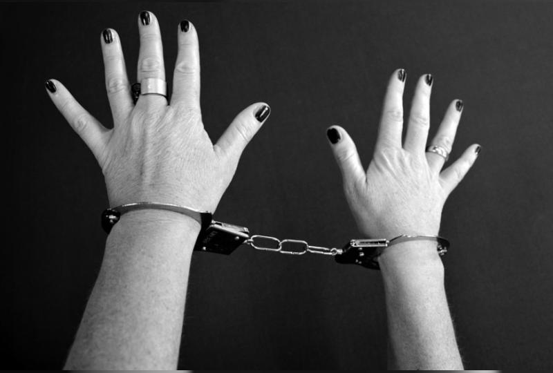 Handcuffed woman