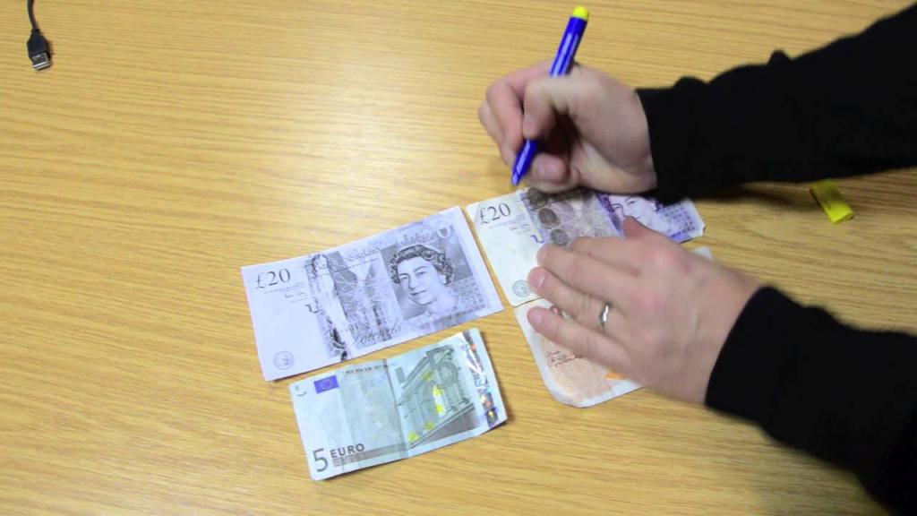 Counterfeiting money.