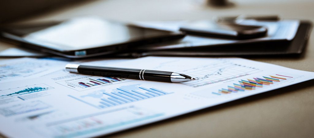 pen with documents on the table